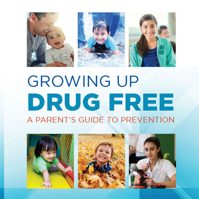 Growing Up Drug Free/A Parent’s Guide to Prevention poster with pictures of six children; one is so young it is being held up by an adult.  