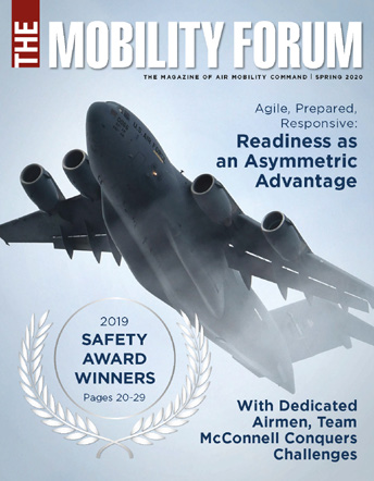 Text and a flying jet on the cover of an issue of The Mobility Forum magazine published for Air Mobility Command. 